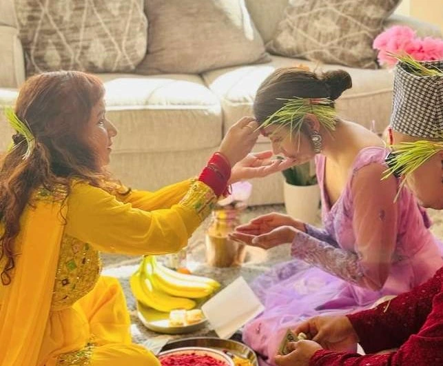 Family during Dashain, receiving and giving Tika, Jamara and Blessings